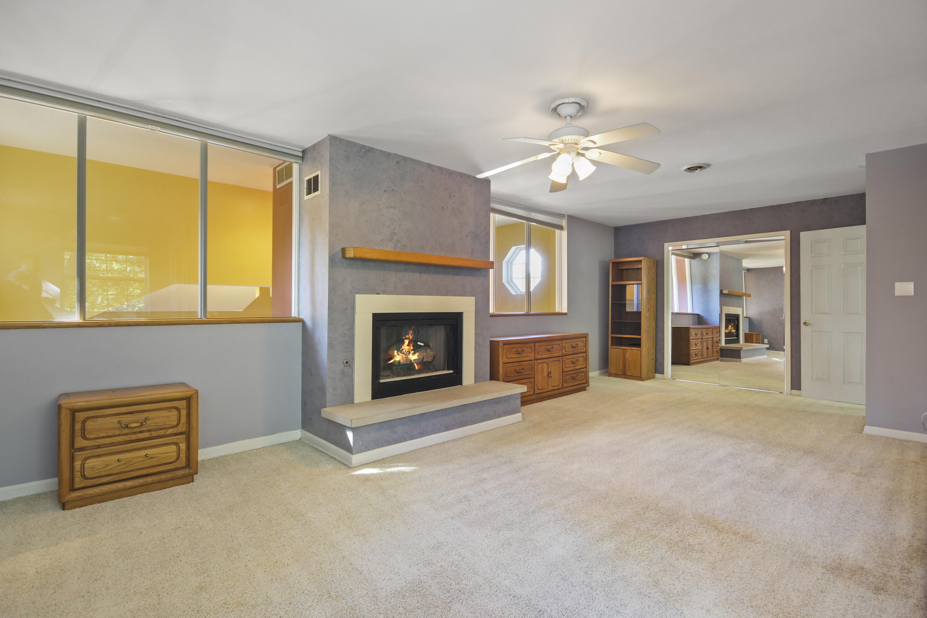 739 Montgomery Street Gary, IN 46403 - Photo 15 of 34 a view of an empty room with a fireplace and a window