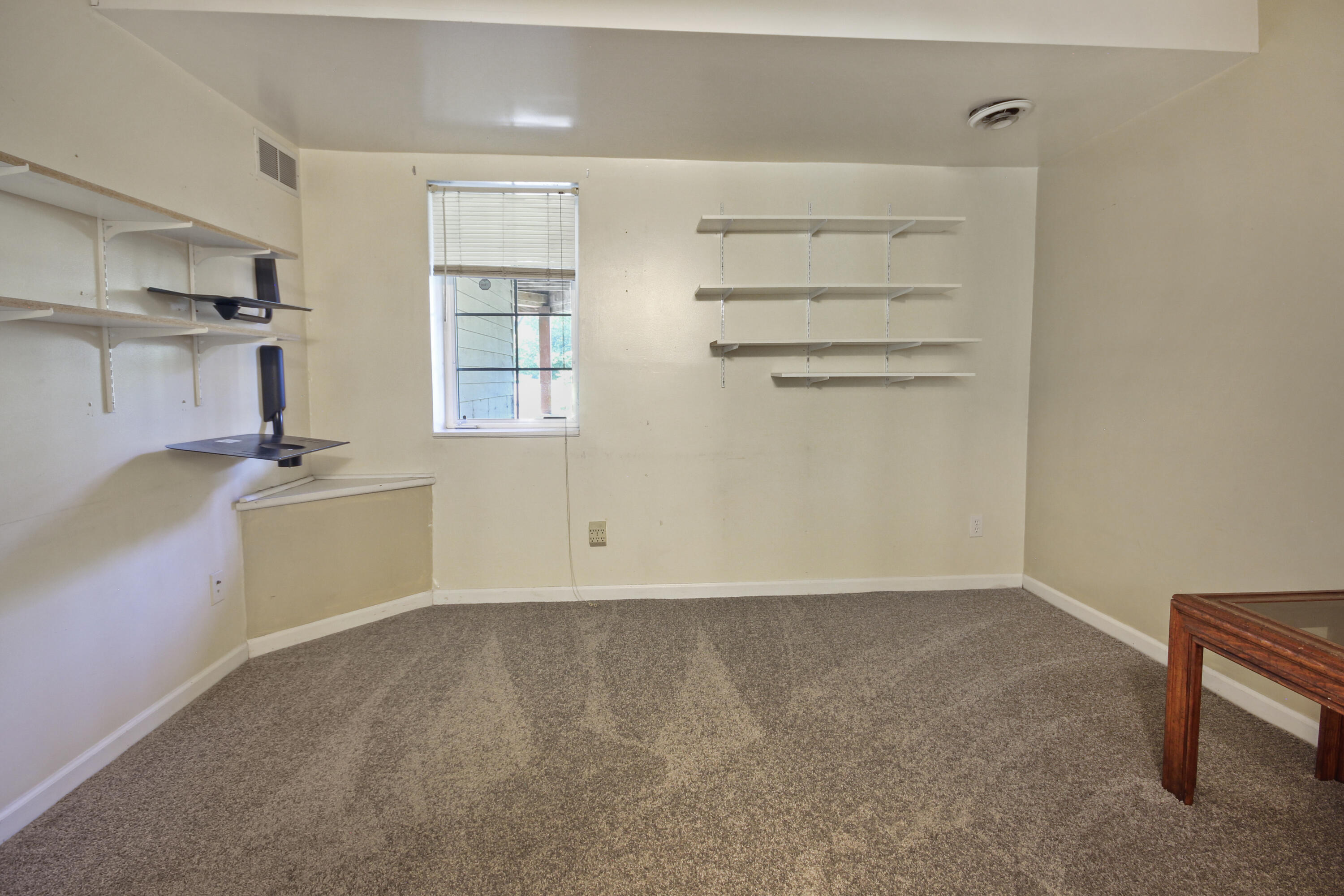 739 Montgomery Street Gary, IN 46403 - Photo 19 of 34 a view of storage and utility room with windows