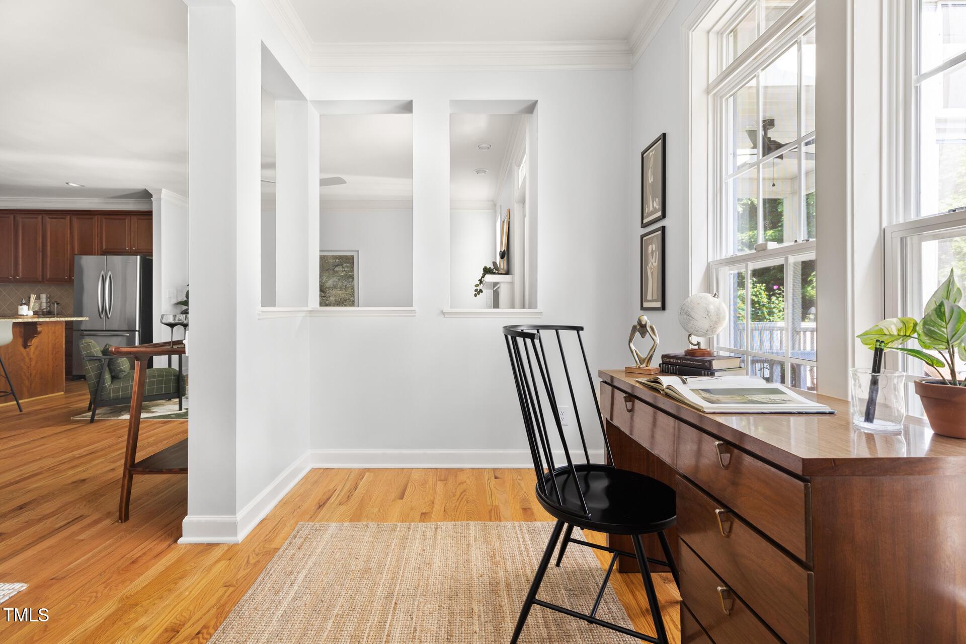 204 Towne Ridge Lane Chapel Hill, NC 27516 - Photo 16 of 36 a view of a dining room with furniture and wooden floor