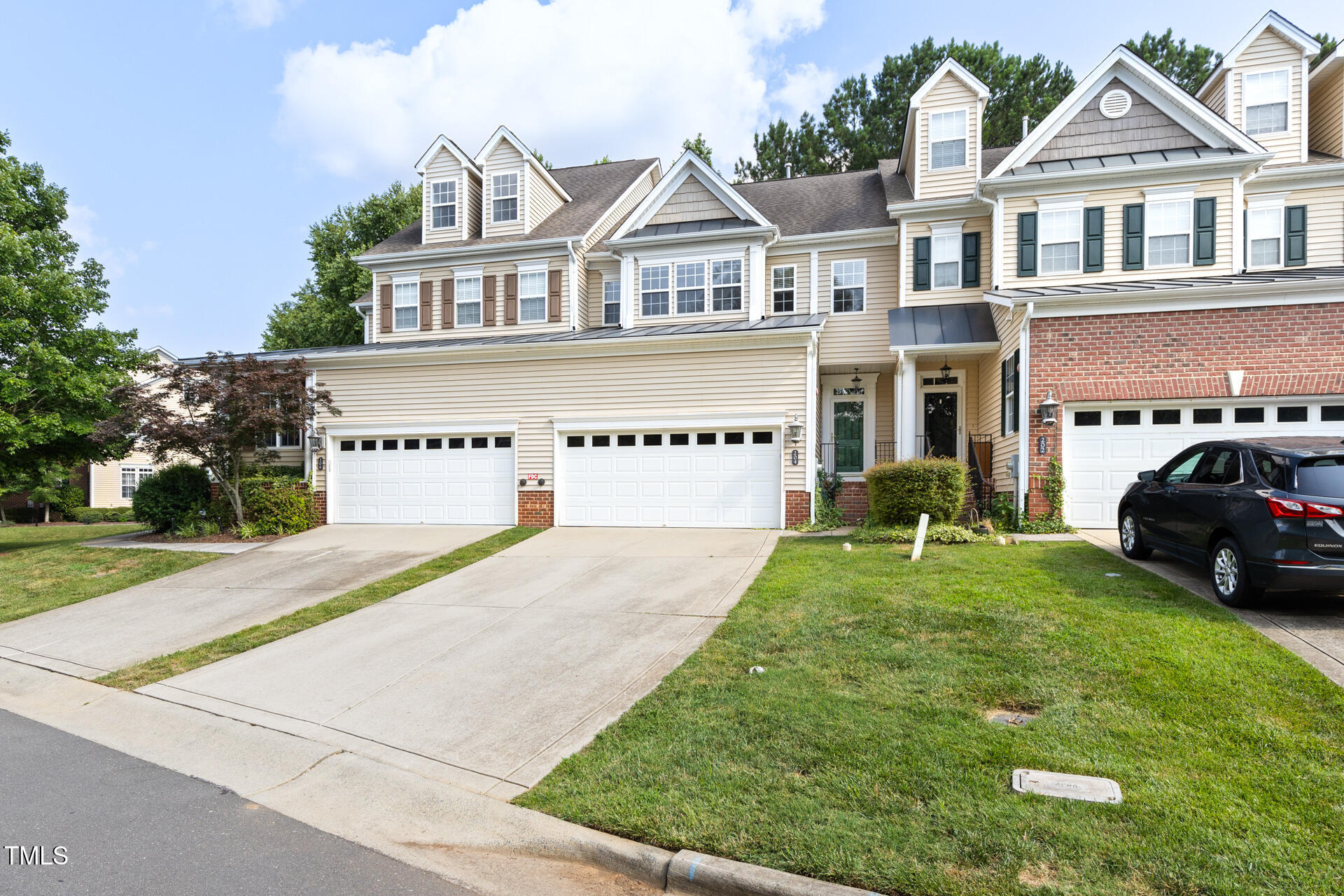 204 Towne Ridge Lane Chapel Hill, NC 27516 - Photo 2 of 36 a house view with a garden space
