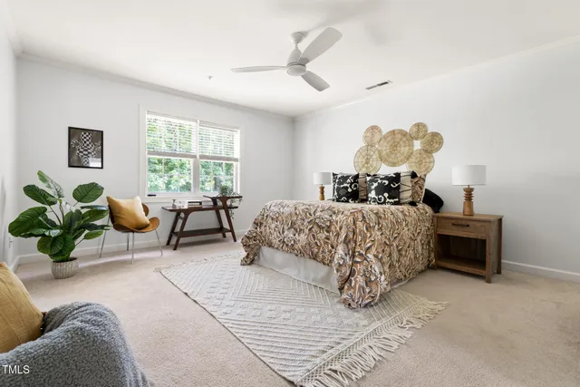 a bedroom with a bed and a couch