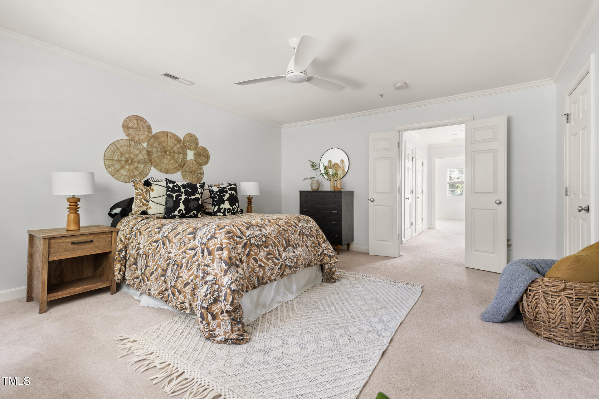 204 Towne Ridge Lane Chapel Hill, NC 27516 - Photo 22 of 36 a bedroom with a bed and a chandelier