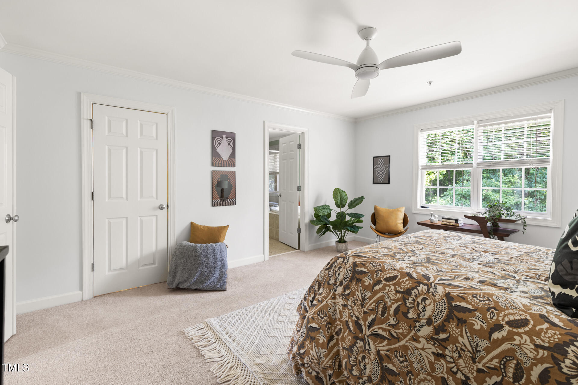 204 Towne Ridge Lane Chapel Hill, NC 27516 - Photo 23 of 36 a spacious bedroom with a large bed couch and a window
