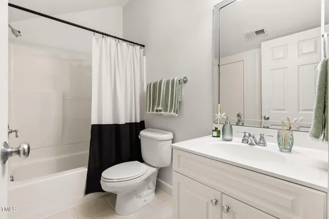 a bathroom with a sink a toilet and a bathtub