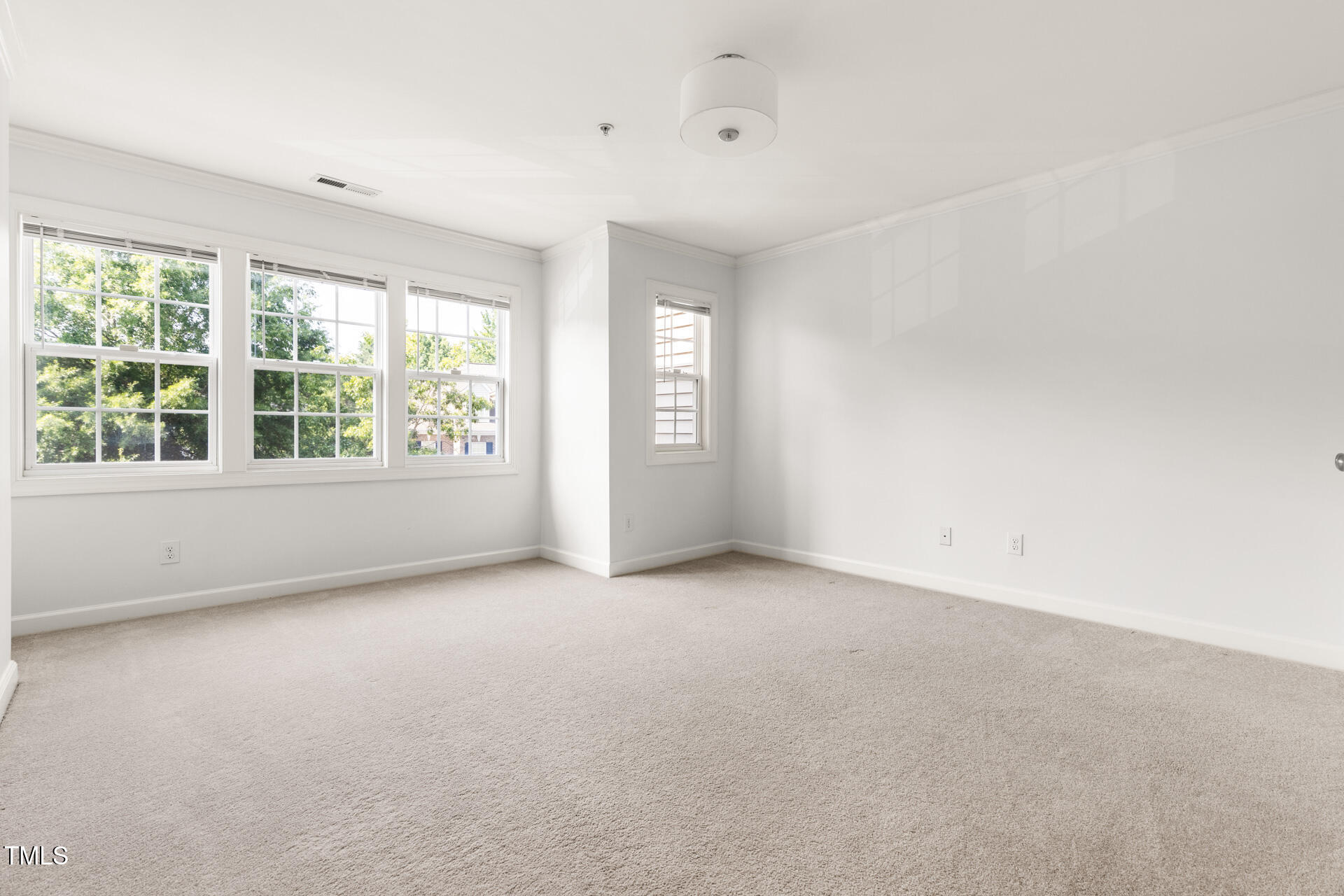 204 Towne Ridge Lane Chapel Hill, NC 27516 - Photo 30 of 36 an empty room with windows