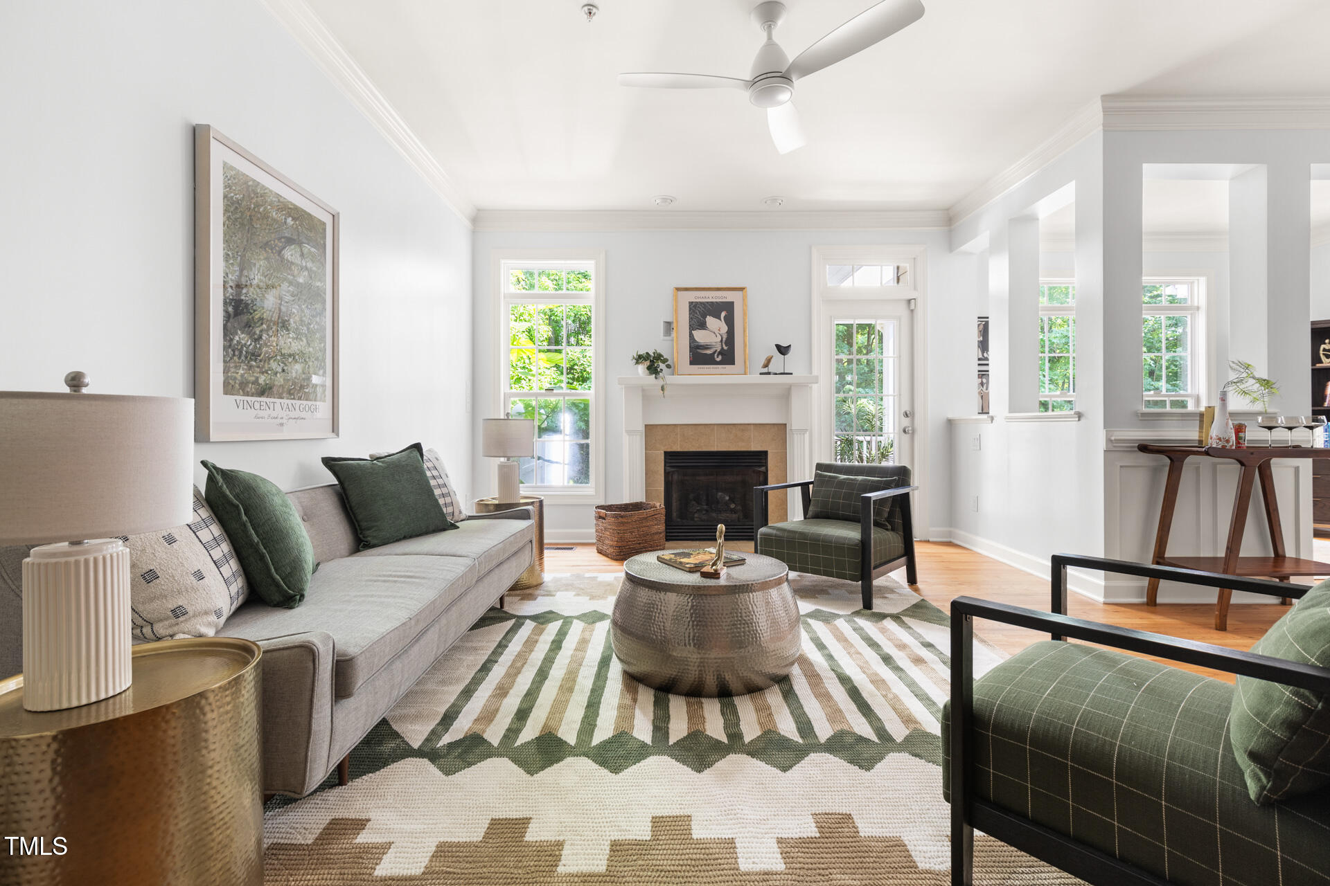 204 Towne Ridge Lane Chapel Hill, NC 27516 - Photo 7 of 36 a living room with furniture a large window and a fireplace