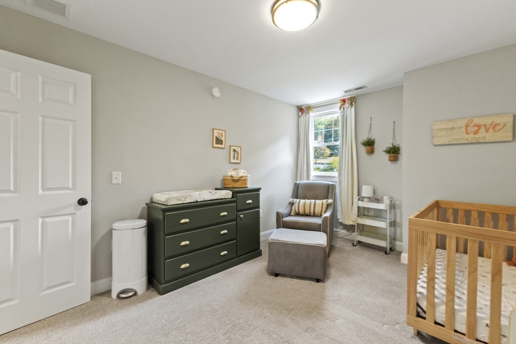112 Nourse Road Bolton, MA 01740 - Photo 25 of 42 a bedroom with furniture and a window