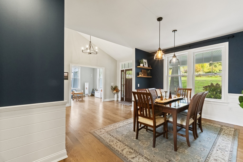 112 Nourse Road Bolton, MA 01740 - Photo 6 of 42 a dining room with furniture window wooden floor