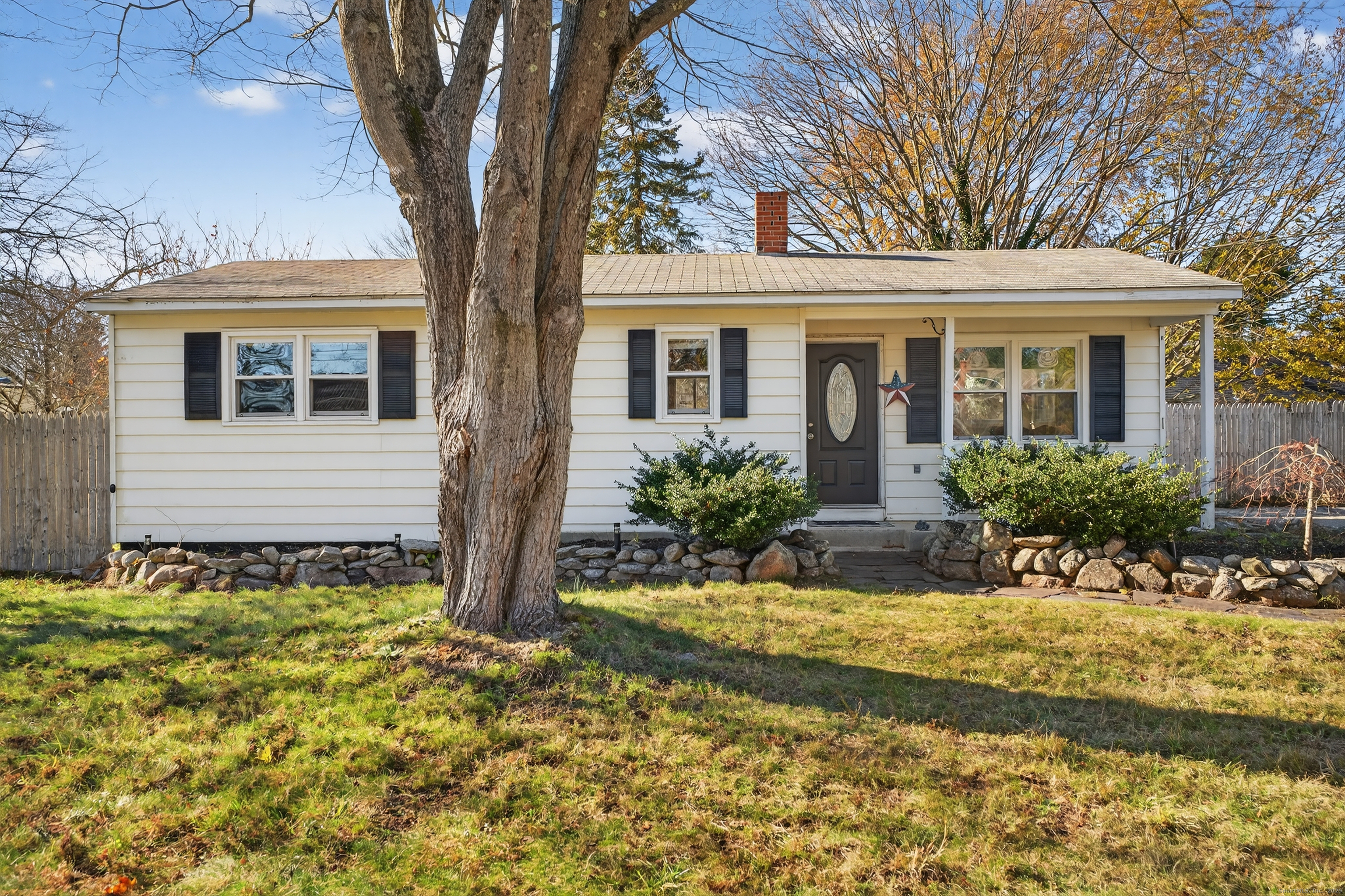 a front view of house with yard