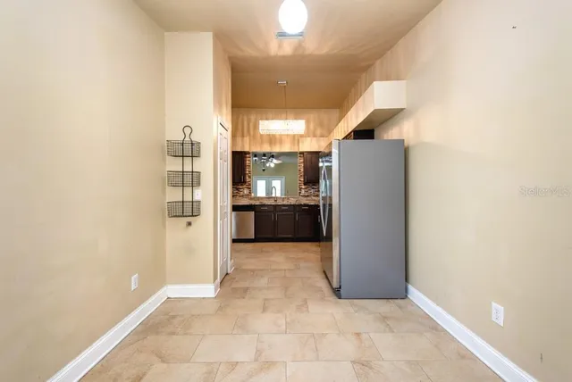 a view of a kitchen with a sink