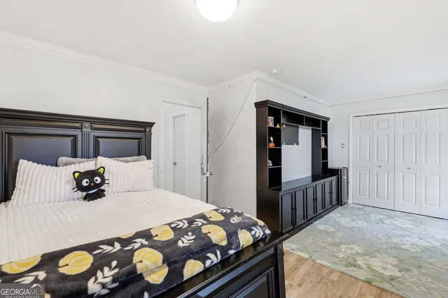 a bathroom with a bathtub and a window