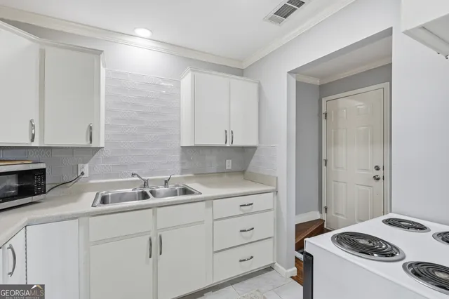 front view of a building with a garden