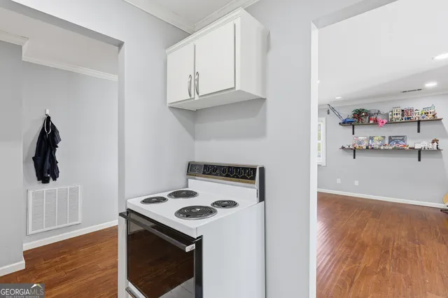 a view of a lake with a yard