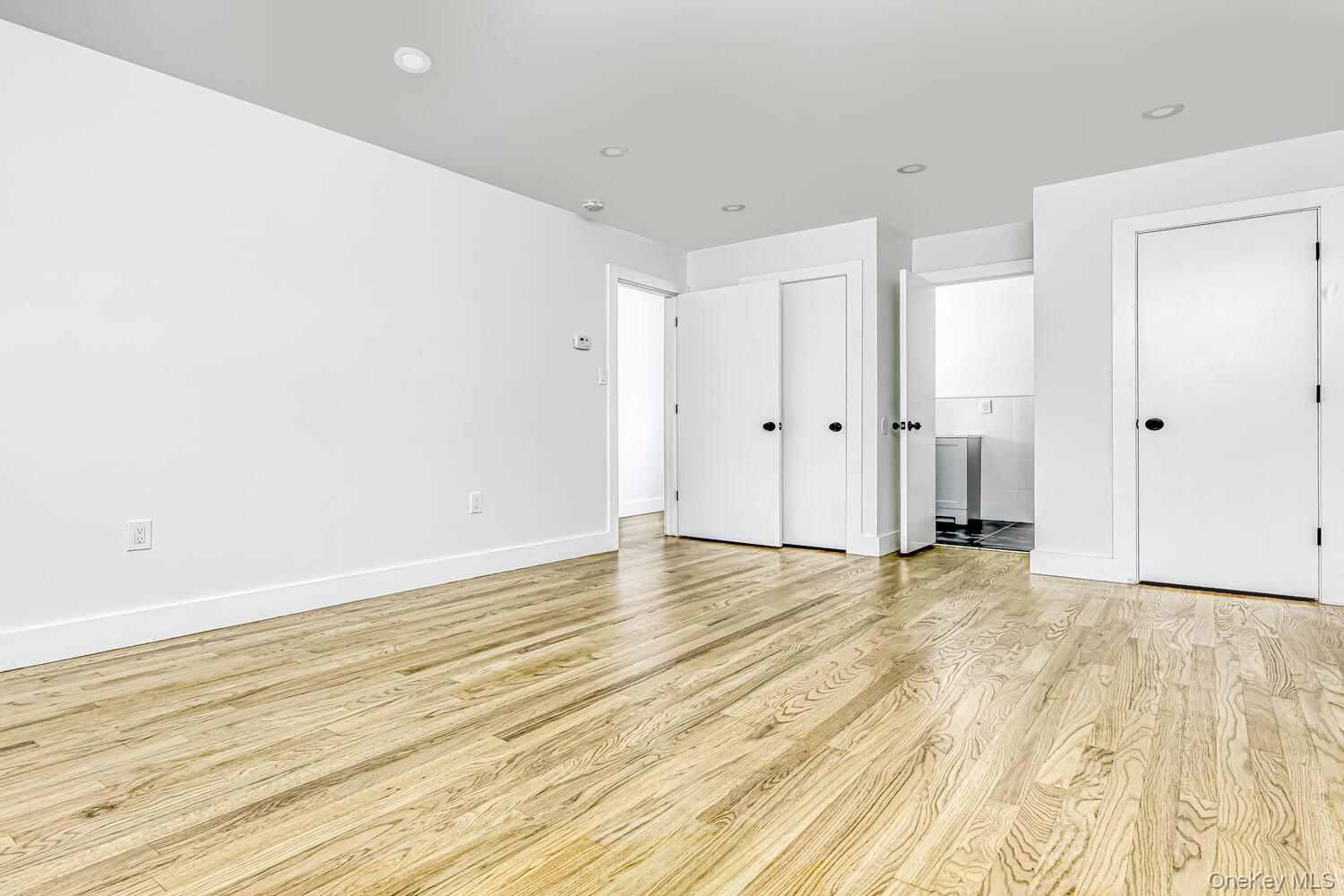 3 Camp Hill Road Pomona, NY 10970 - Photo 13 of 26 a view of an empty room with wooden floor