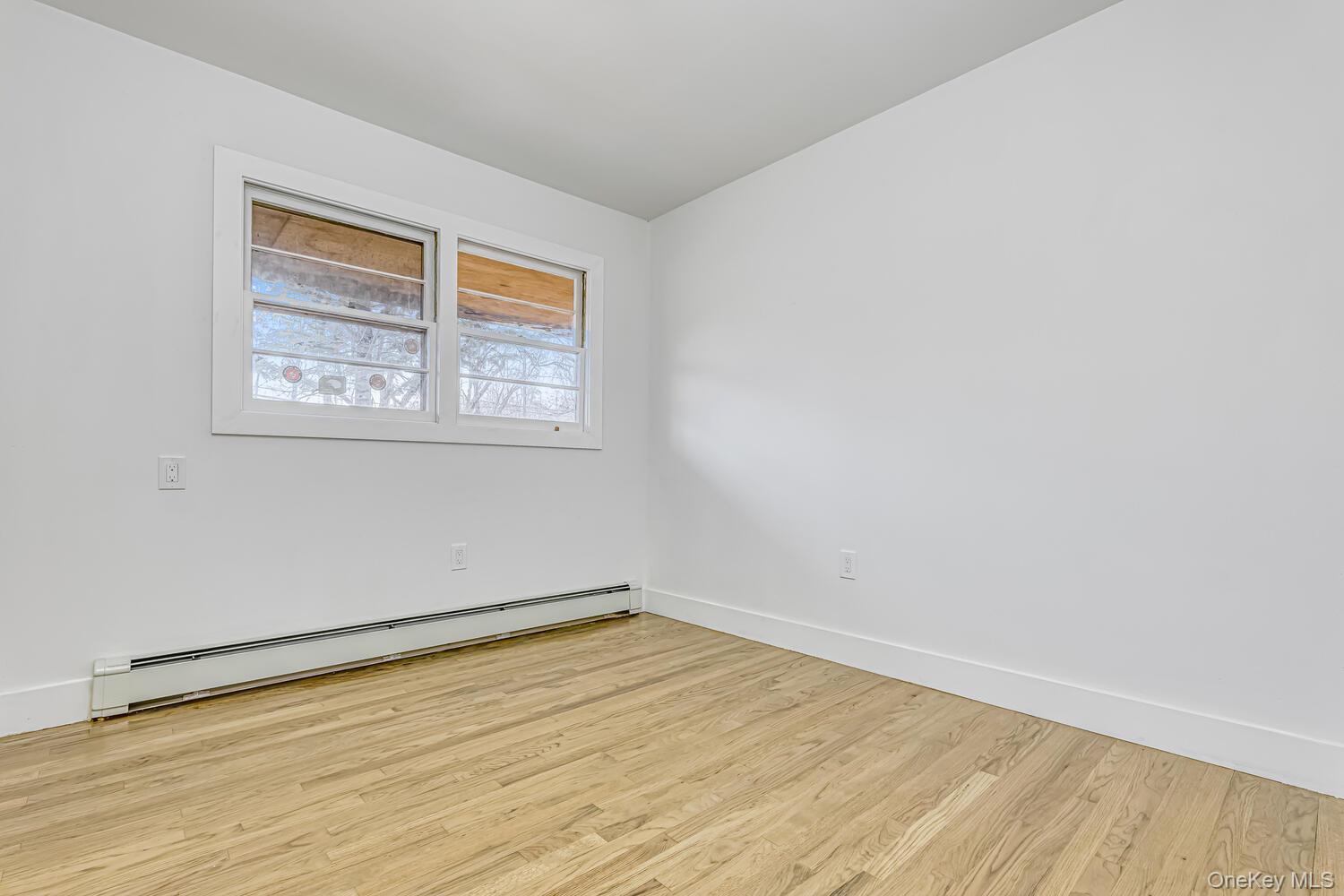 3 Camp Hill Road Pomona, NY 10970 - Photo 15 of 26 wooden floor in an empty room