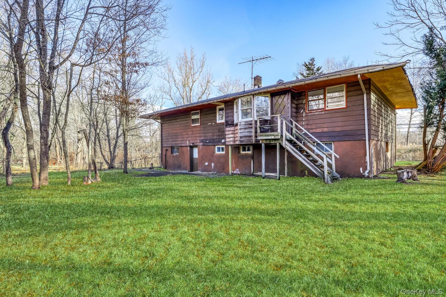 3 Camp Hill Road Pomona, NY 10970 - Photo 5 of 26 a view of a house with a backyard