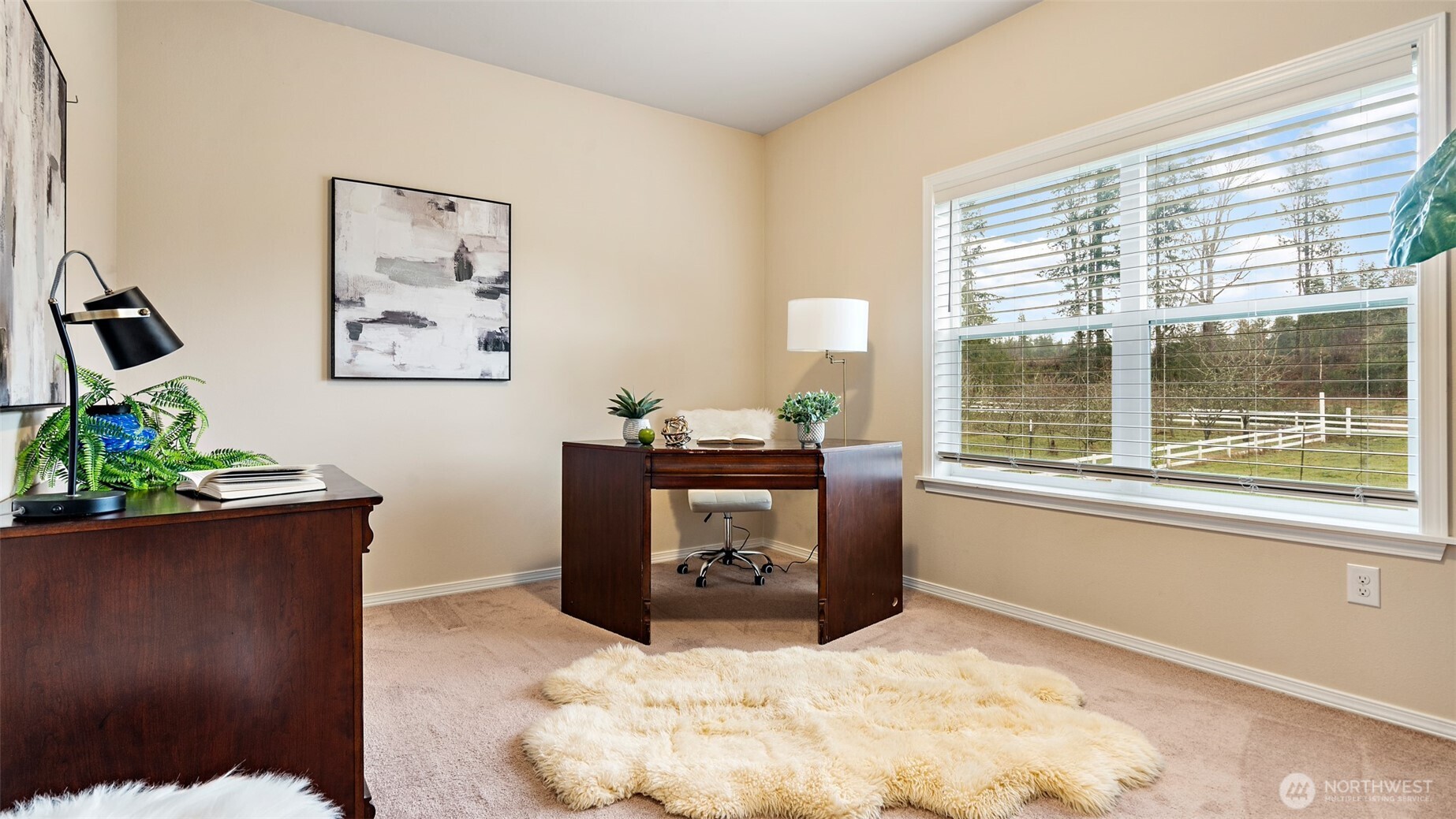 25965 Tytler Road Northeast Poulsbo, WA 98370 - Photo 19 of 40 a bed room with a bed and a window