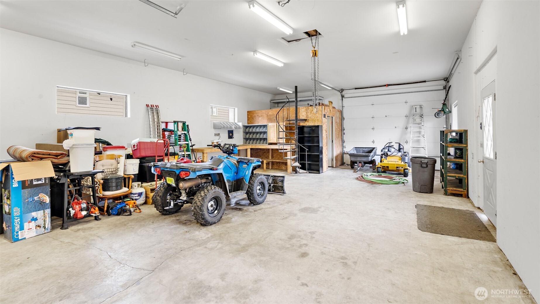 25965 Tytler Road Northeast Poulsbo, WA 98370 - Photo 28 of 40 a view of a room with lots of wooden furniture