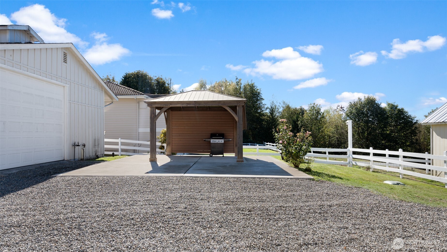 25965 Tytler Road Northeast Poulsbo, WA 98370 - Photo 30 of 40 a view of a backyard with a slide