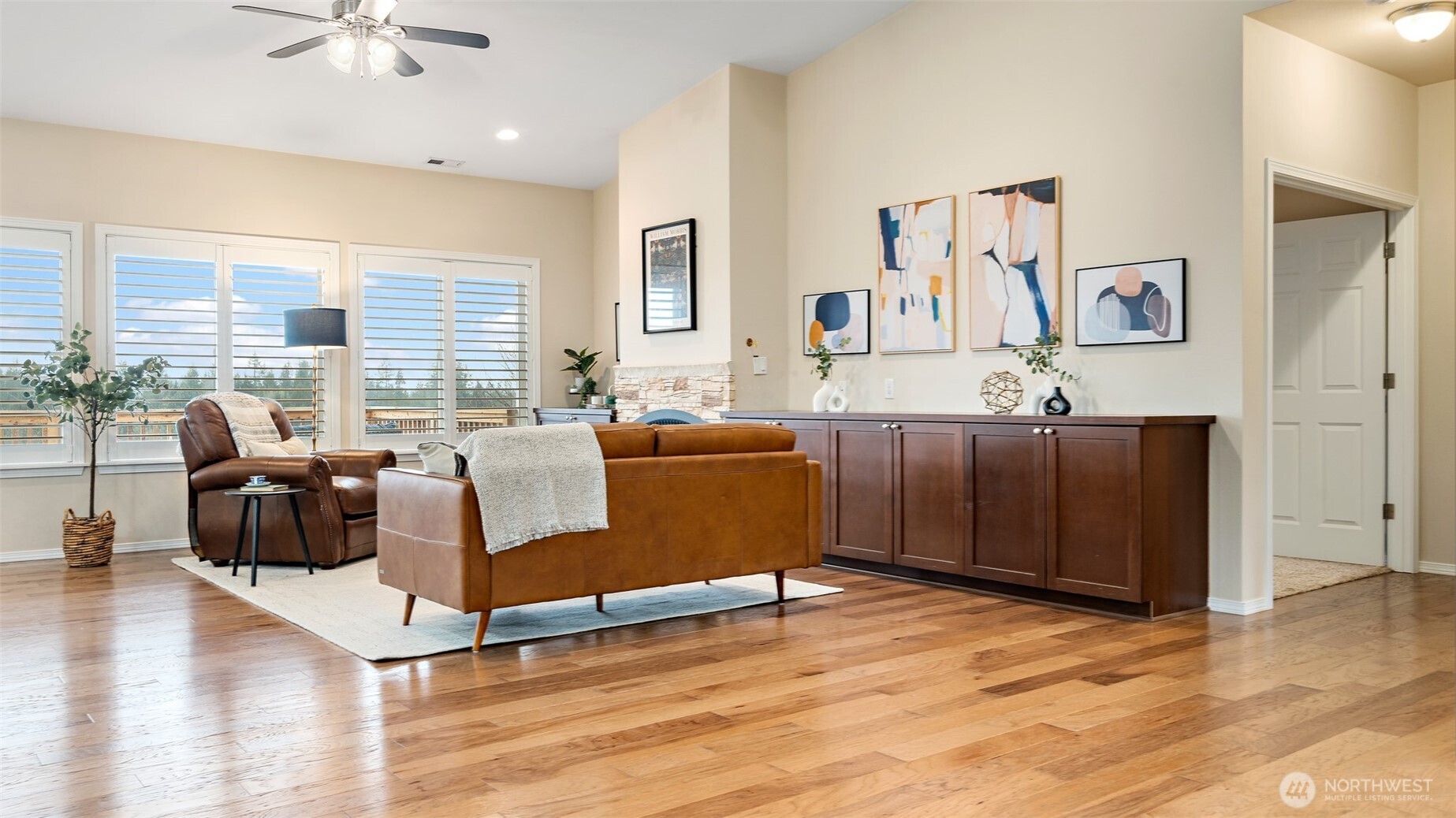 25965 Tytler Road Northeast Poulsbo, WA 98370 - Photo 8 of 40 a living room with furniture and a large window
