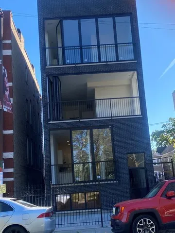 front view of a house with a balcony