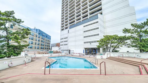 a view of street with tall buildings