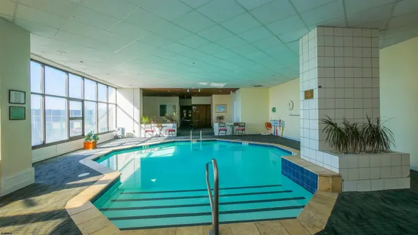 an outdoor space with swimming pool