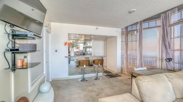 a bed room with a bed and a mirror