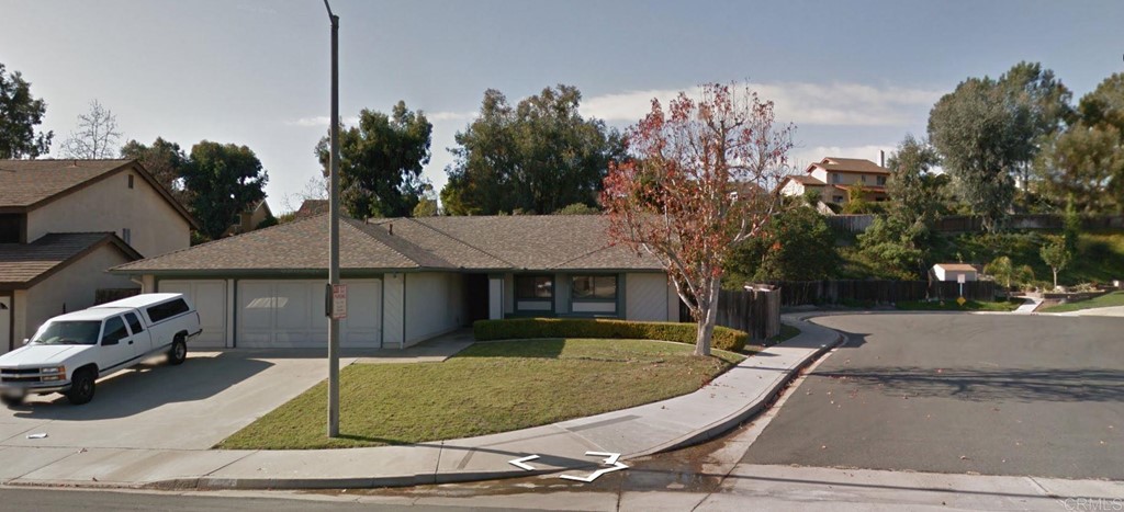 3575 Winslow Road Oceanside, CA 92056 - Photo 1 of 1 a front view of a house with garden