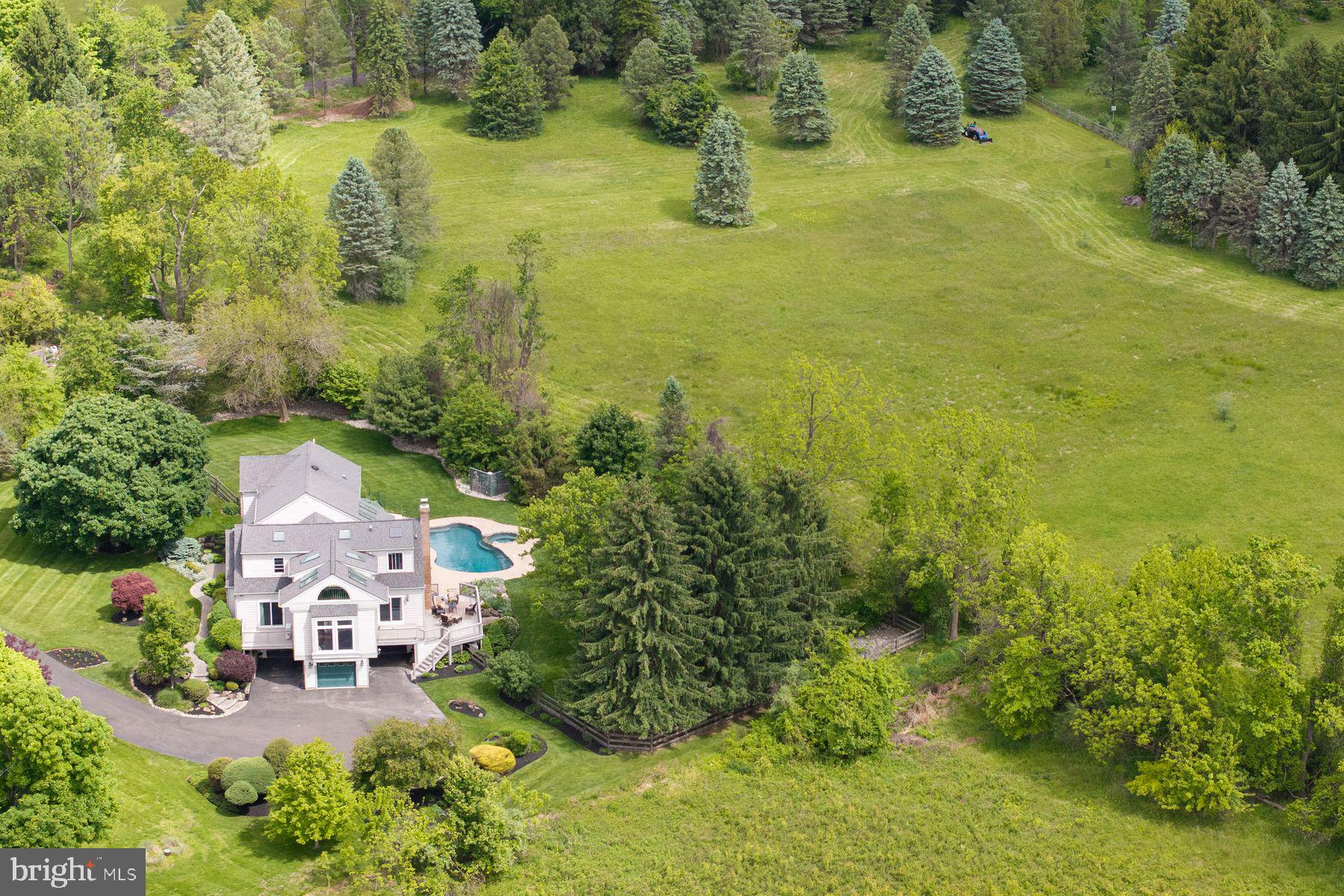 4009 Smoke Road Doylestown, PA 18902 - Photo 52 of 52 an aerial view of residential houses with outdoor space and trees all around