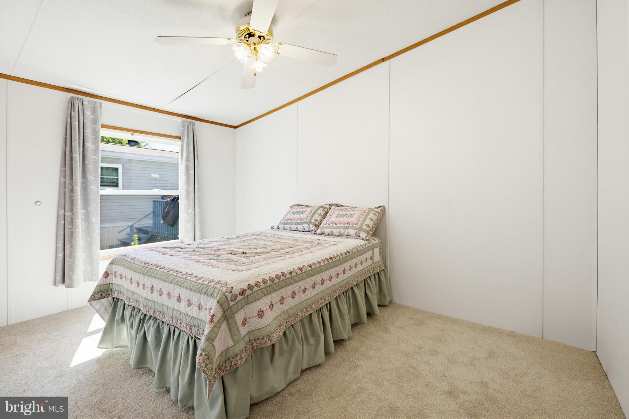 315 Lewis Road Annville, PA 17003 - Photo 20 of 33 a bedroom with a bed and a chandelier
