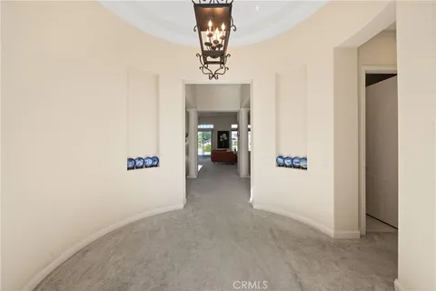 a view of a livingroom with a chandelier