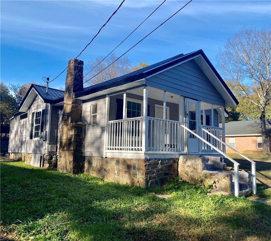 2201 Southern Street Northeast Rome, GA 30161 - Photo 2 of 9 a front view of house with yard and green space