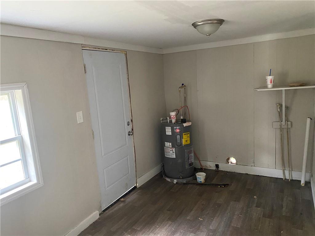 2201 Southern Street Northeast Rome, GA 30161 - Photo 8 of 9 a view of empty room with wooden floor and fan