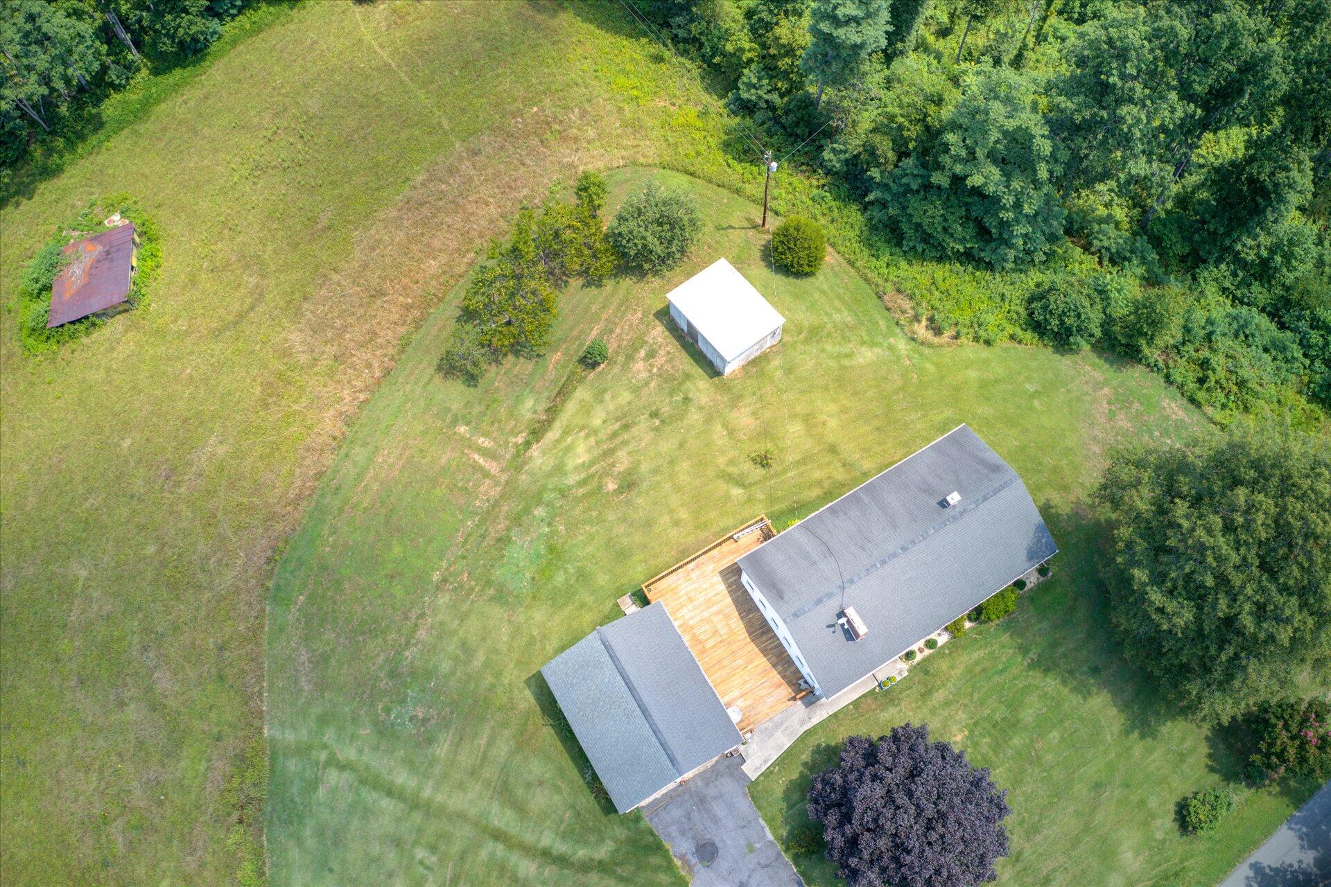 950 Thompson Ridge Road Ferrum, VA 24088 - Photo 30 of 31 a view of a yard with an outdoor space