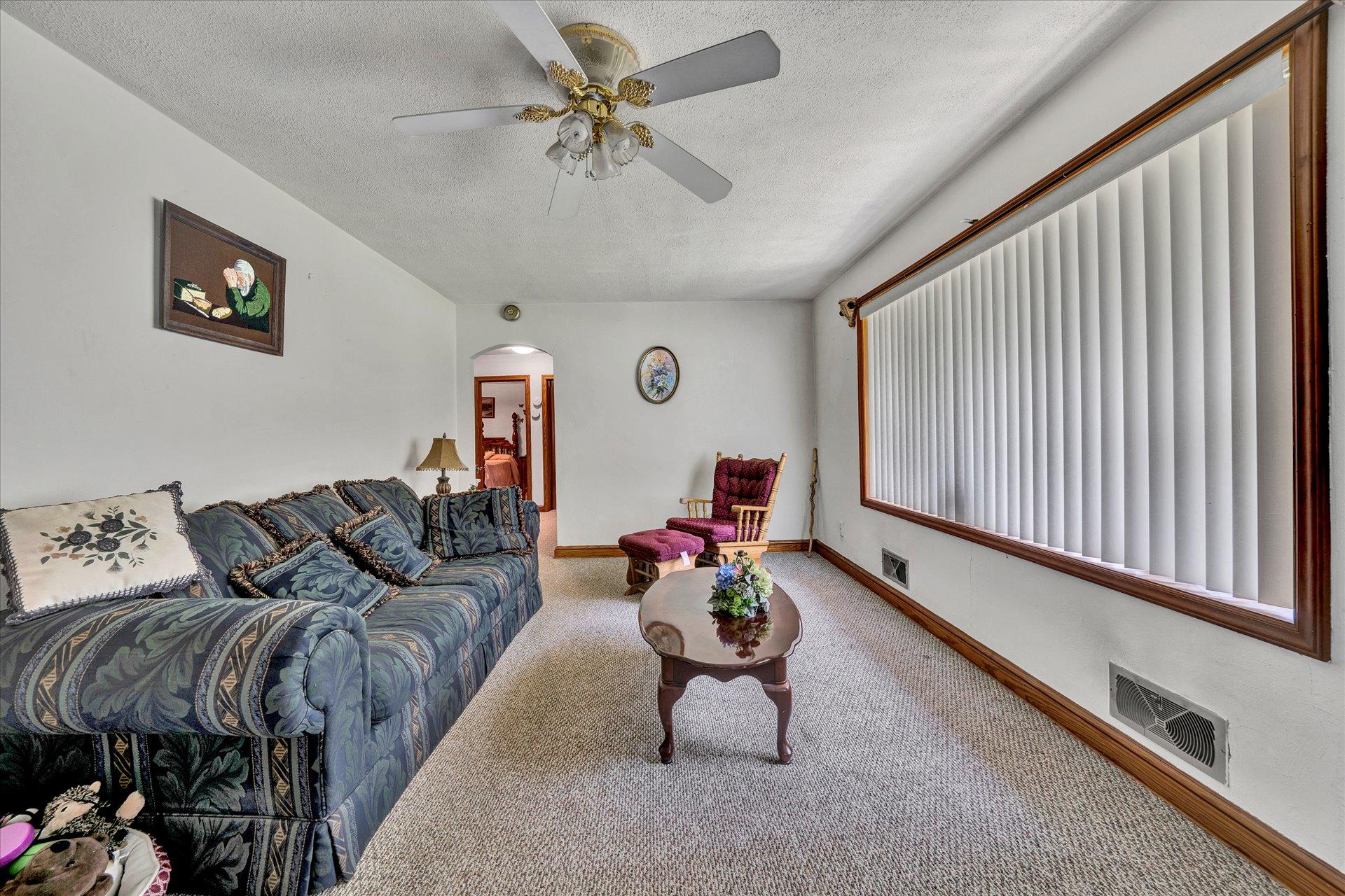 950 Thompson Ridge Road Ferrum, VA 24088 - Photo 7 of 31 a living room with furniture and a rug