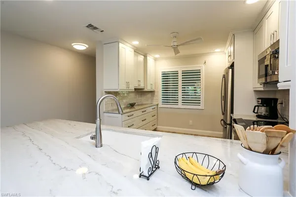 a bathroom with a sink and a bathtub