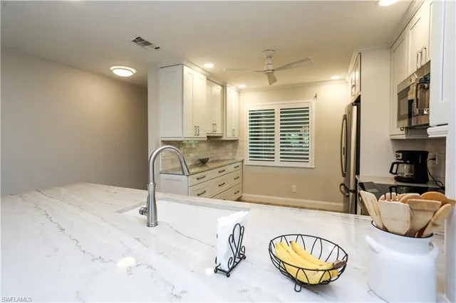 a bathroom with a sink and a bathtub