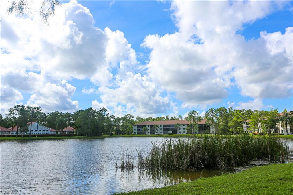5733 Deauville Circle, Unit G308 Naples, FL 34112 - Photo 50 of 50 a view of a lake
