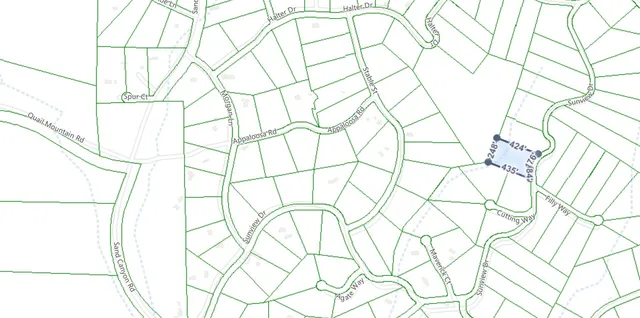 a picture of white walls with a window