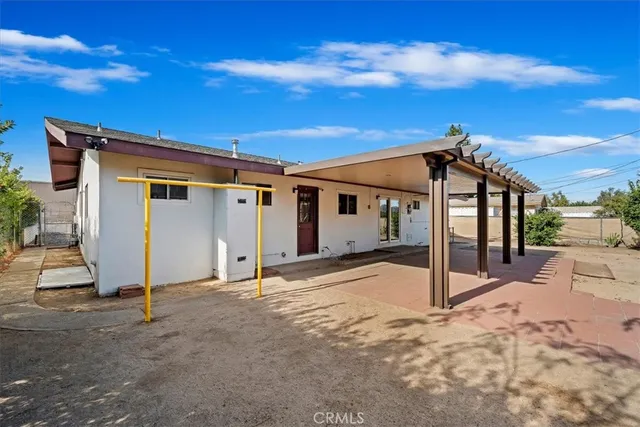 a view of a house with a patio