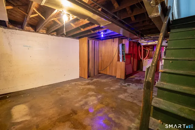 a view of a room with wooden walls