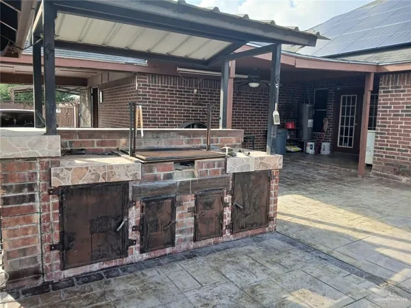 a view of a kitchen with outdoor space