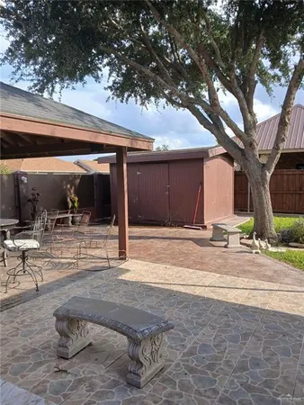 a view of a porch with a tree