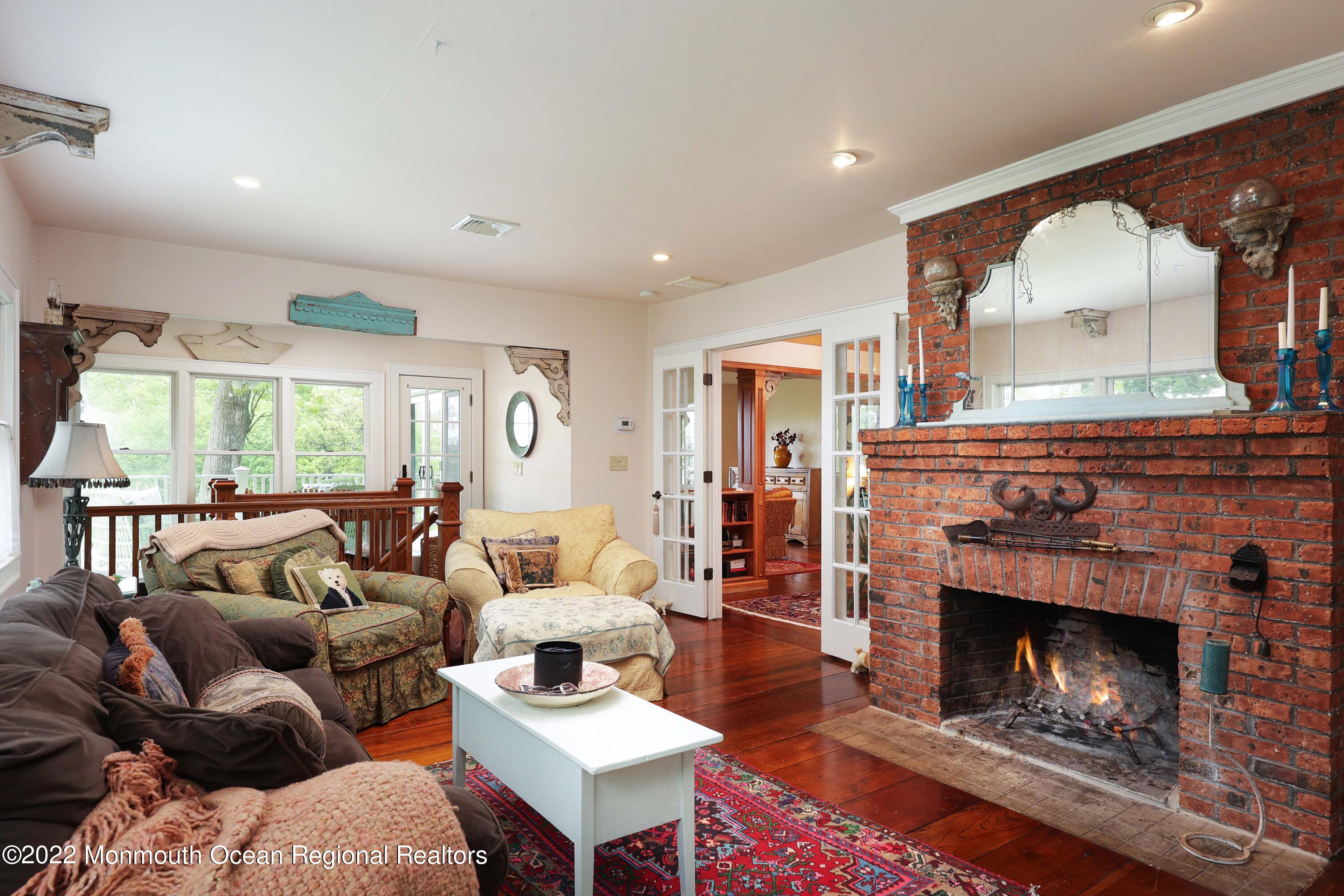 34 Hill Road Atlantic Highlands, NJ 07716 - Photo 4 of 37 Living Room With wood Burning Fireplace