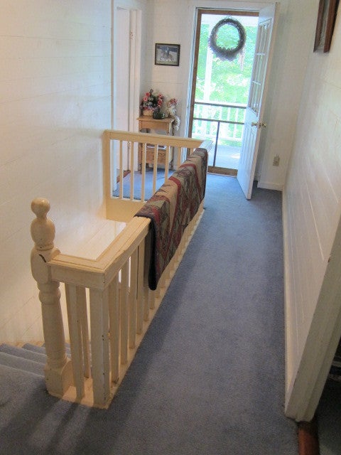 2025 Pete Lynch Road Secondcreek, WV 24974 - Photo 34 of 94 Top of staircase on second floor, entry to second floor covered porch.