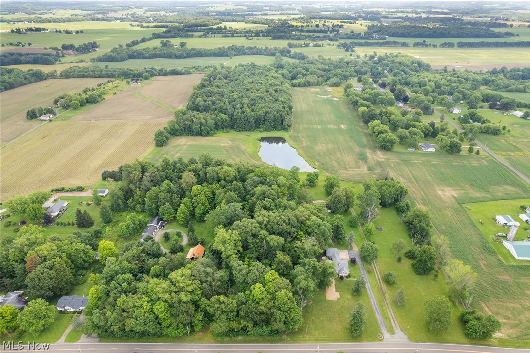 22840 Buck Road Alliance, OH 44601 - Photo 31 of 36 Overview of rural landscape featuring a nearby body of water and extensive farmland