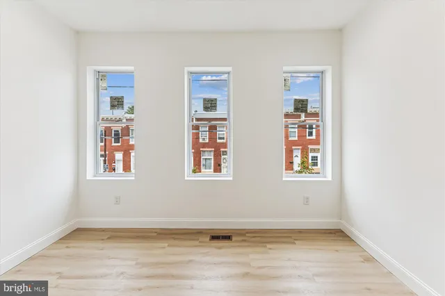 an empty room with windows