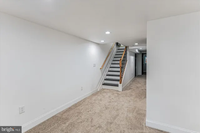 a view of hallway with a large window