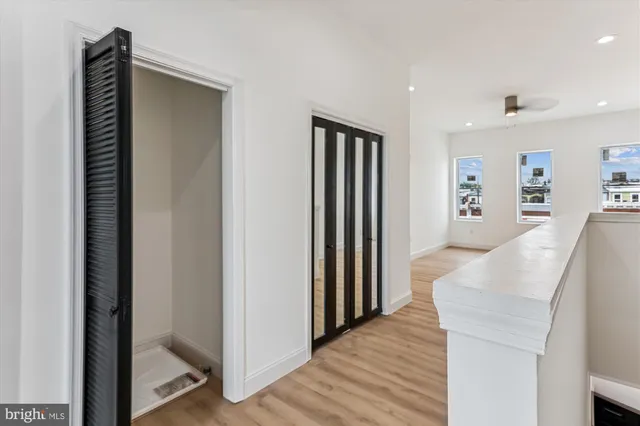 a view of a kitchen from the hallway